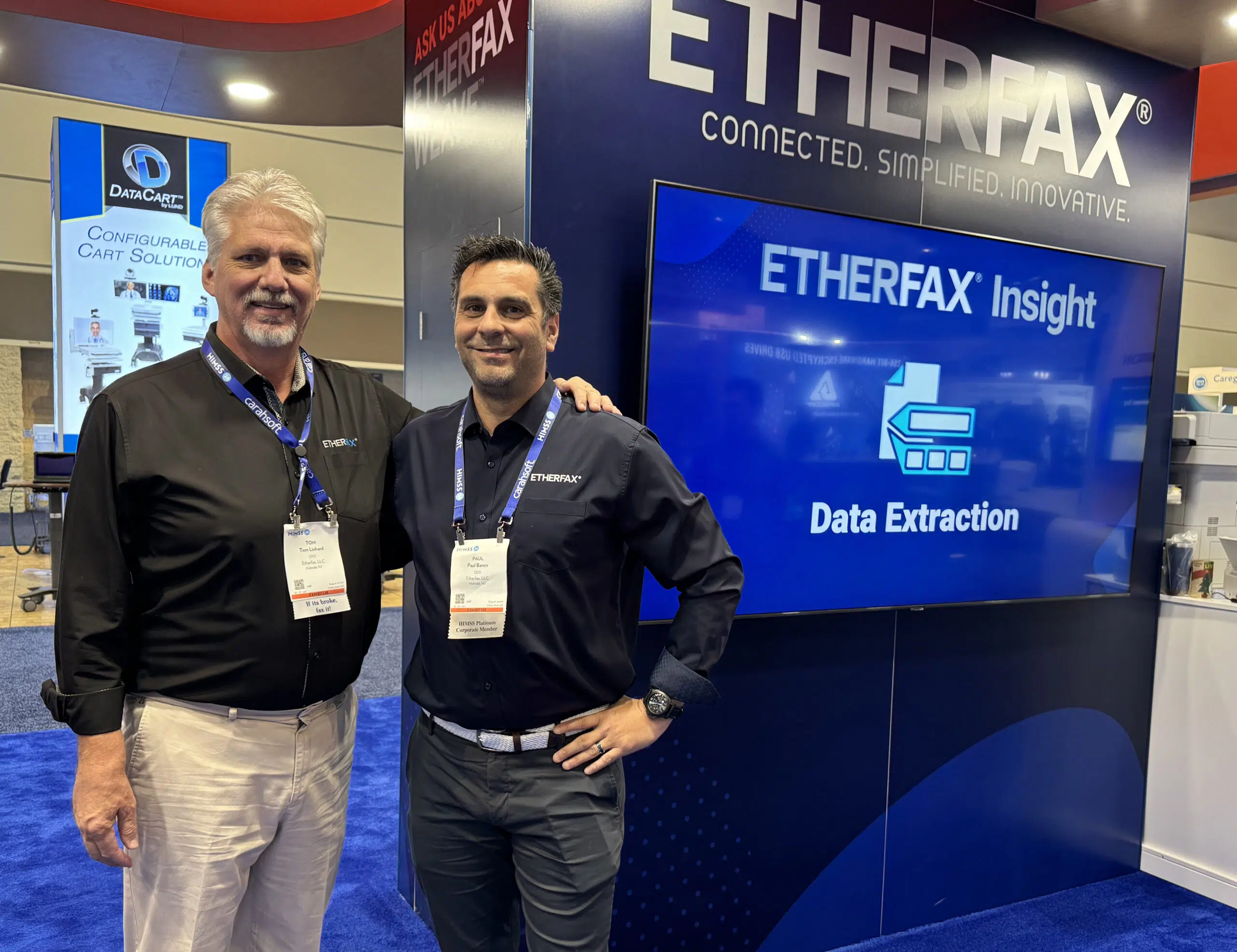 Paul Banco and Tom Linhard at ETHERFAX booth at HIMSS24